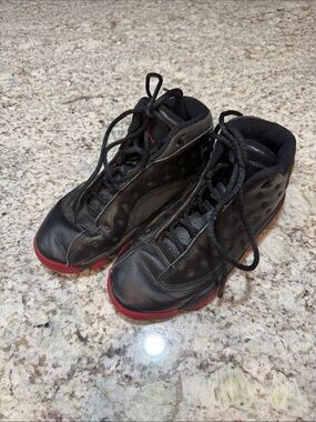 Men's Black Sneakers with Red Sole Accent